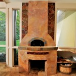 Made in Italy, the pizza oven weighs over 825 pounds and extends fifteen feet via a chimney. The oven arrived in clay sections which were assembled by Parker and team-- who also designed the oven’s backsplash and unique facade.